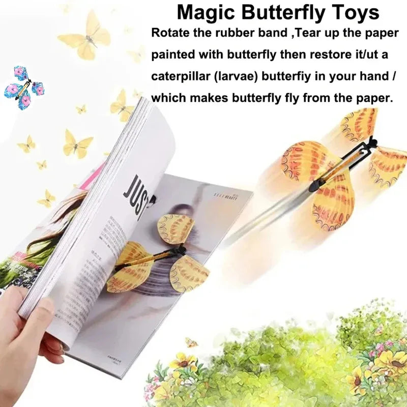 A hand holds a magic butterfly toy that rotates a rubber band to tear up paper and restore a butterfly.