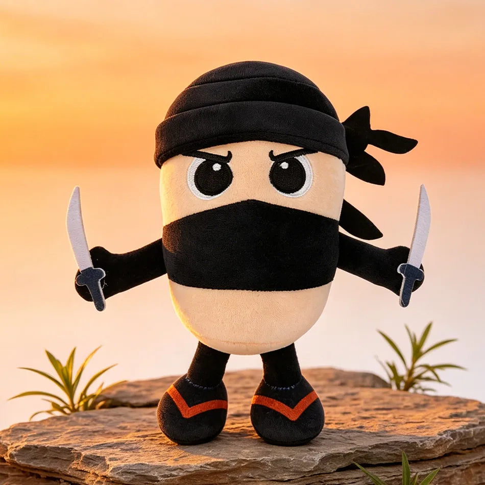 A black and white plush toy of a shark with a mask and swords standing on a rock against an orange sunset background.