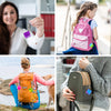 A woman holds a purple mini pop keychain fidget toy while a child wears a pink backpack.
