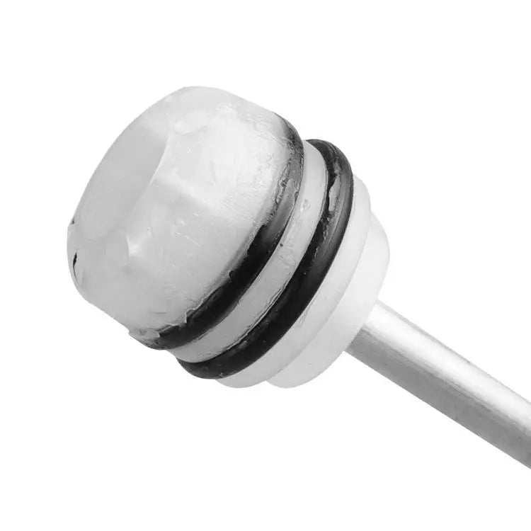 Silver manual fluid transfer syringe pump used for car oil extraction and brake bleeding.