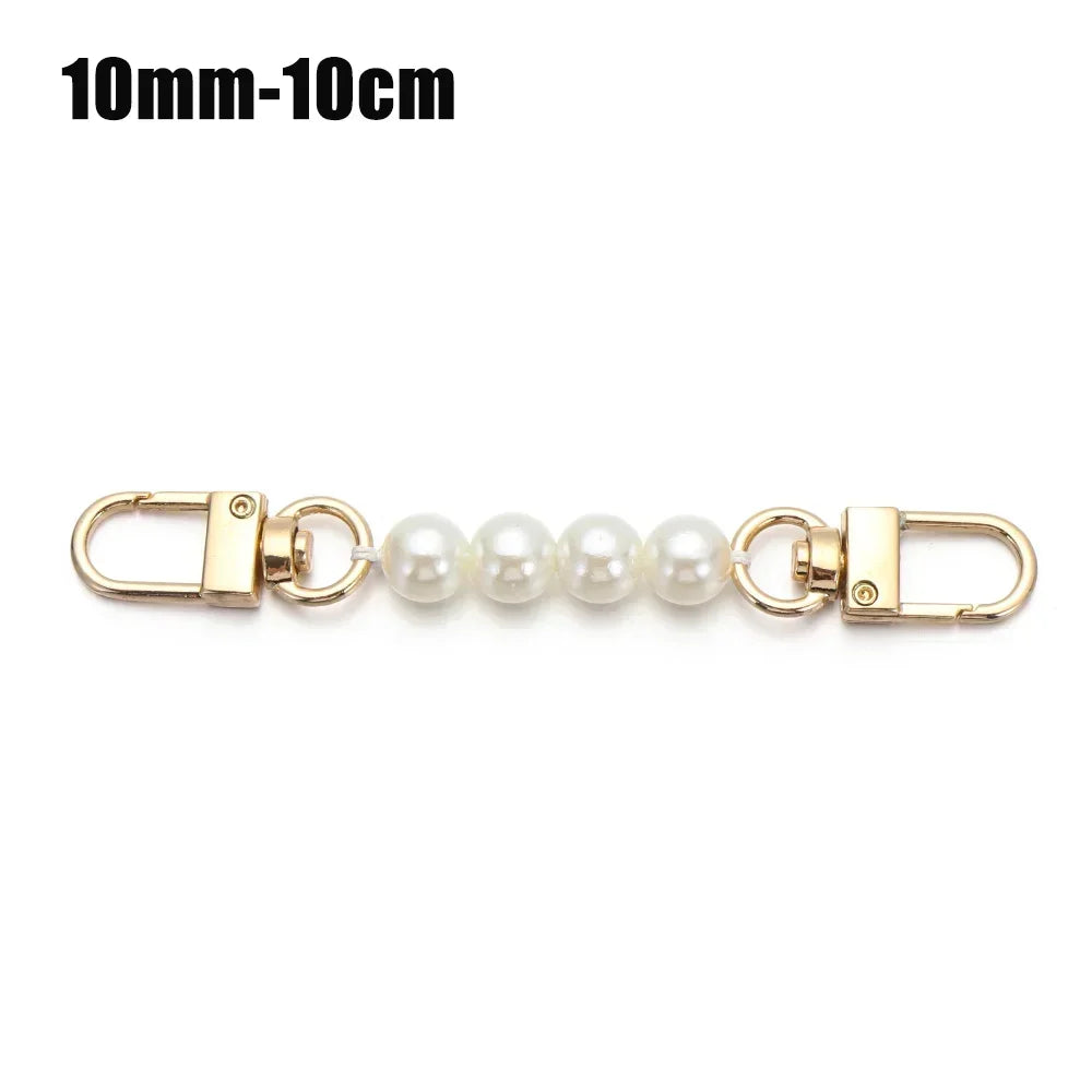 A delicate gold-toned chain strap featuring multiple pearls, suitable for handbags and DIY purses.