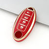 A red and gold TPU car key case cover with multiple buttons for Nissan and Infiniti models