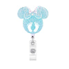 A sparkly blue nurse badge reel featuring a Mickey Mouse silhouette design.