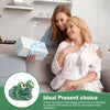 A woman is smiling while holding a hand-painted ceramic frog toilet spigot cover.