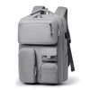 A gray travel backpack with a laptop compartment and multiple storage pockets.