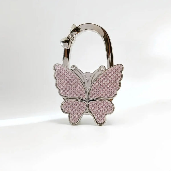 Gancho plegable en forma de mariposa plateada para bolsos
