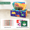 A colorful dinosaur tissue box filled with silk scarves and double-sided patterned sound paper.
