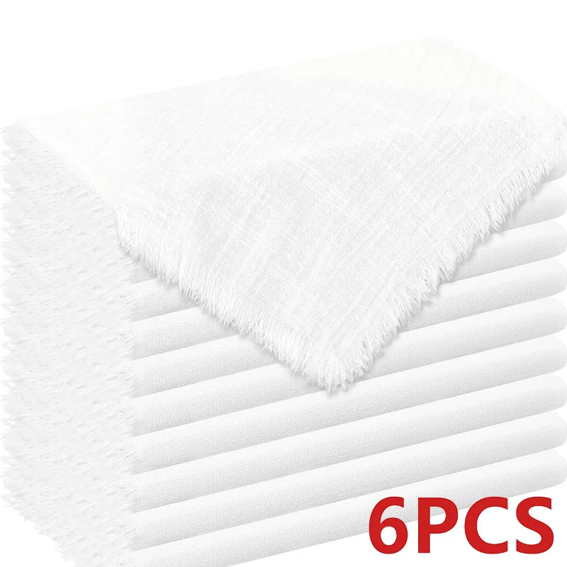 A stack of six white raw-edge polyester cloth napkins viewed from above.