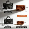 Comparison of a large black leather bag and a small brown felt organizer insert.
