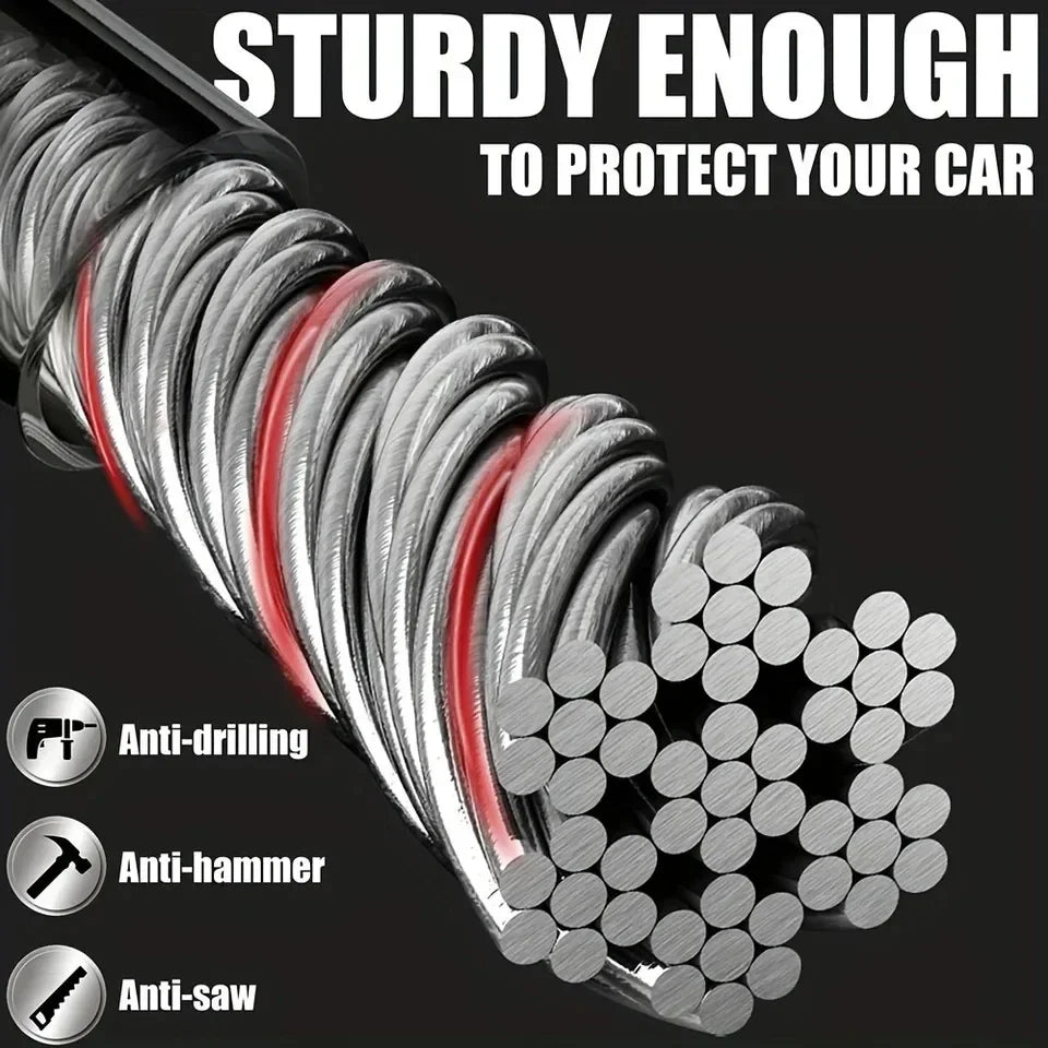 A close-up view of a sturdy, silver and red spiral lock designed to protect a car's steering wheel.