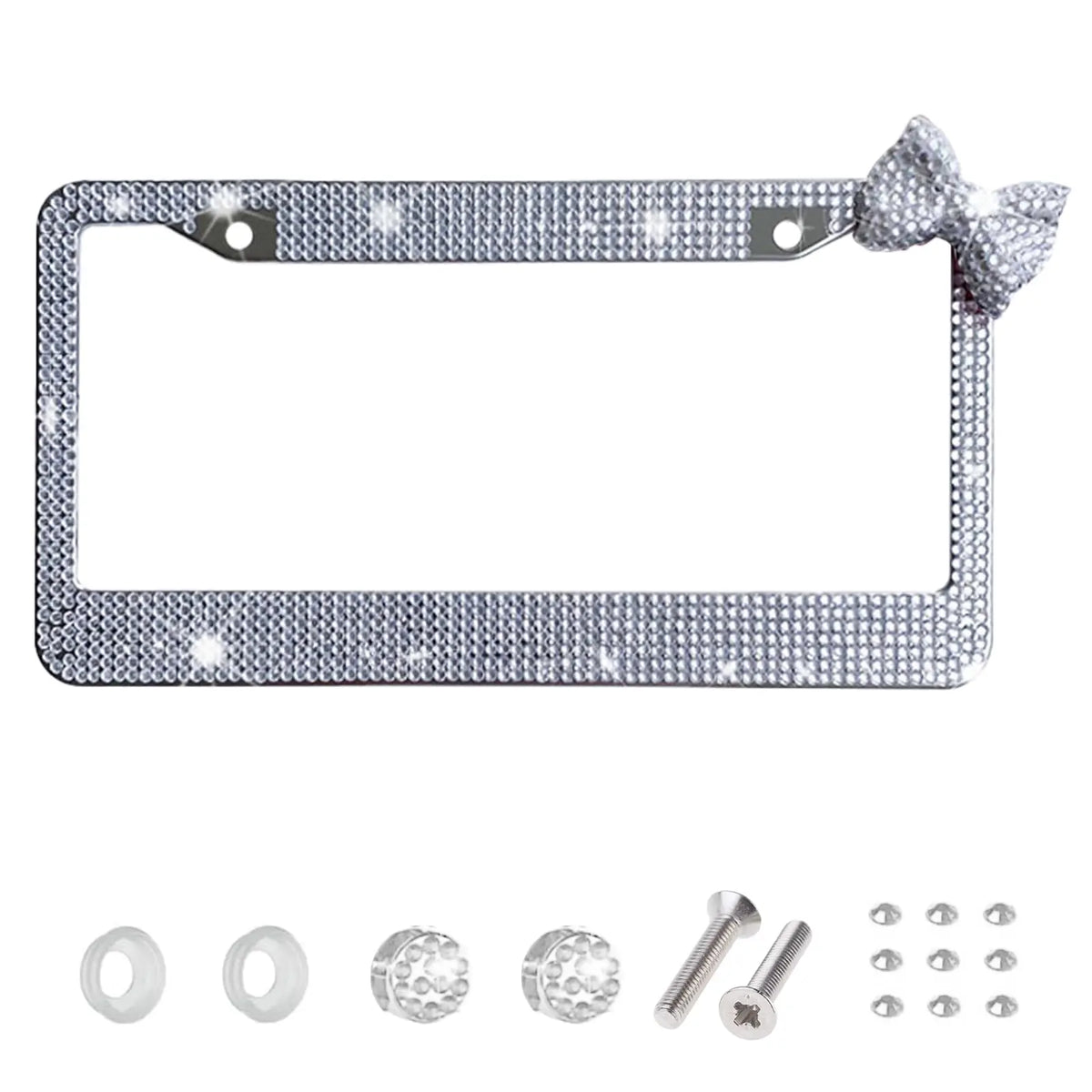 Silver rhinestone license plate frame with a bow accent and mounting hardware