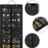 A black felt eyewear organizer with 16 slots, featuring various sunglasses and eyeglasses.