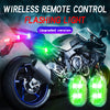 A motorcycle is shown with a flashing neon light accessory installed on the front, highlighting its engine and components.