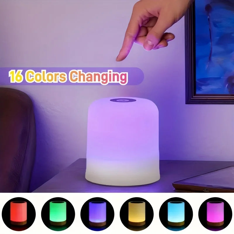 A touch-activated LED night light displays various colors, including red, green, blue, yellow, and purple.