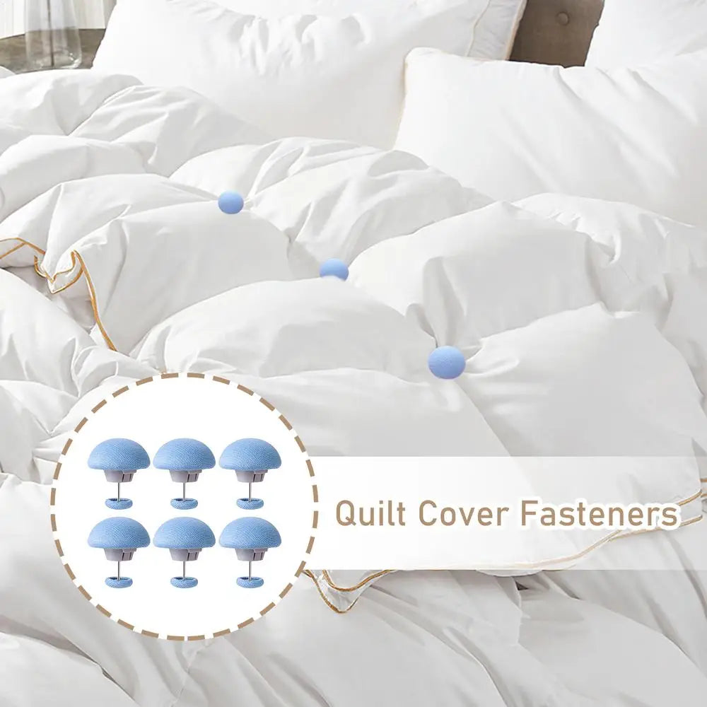 A close-up view of white bedding with six light blue quilt cover fasteners visible on the duvet cover.