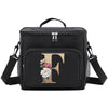 Black insulated canvas lunch bag with a gold initial F and adjustable strap