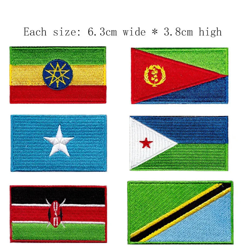 A collection of embroidered patches featuring various flags, including the Dominican Republic flag.