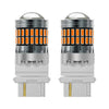A pair of LED turn signal and reverse light bulbs with clear glass lenses and silver housing.
