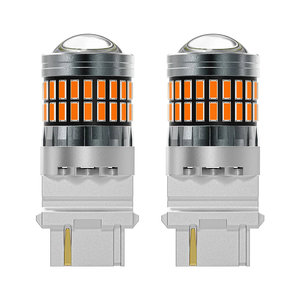 A pair of LED turn signal and reverse light bulbs with clear glass lenses and silver housing.