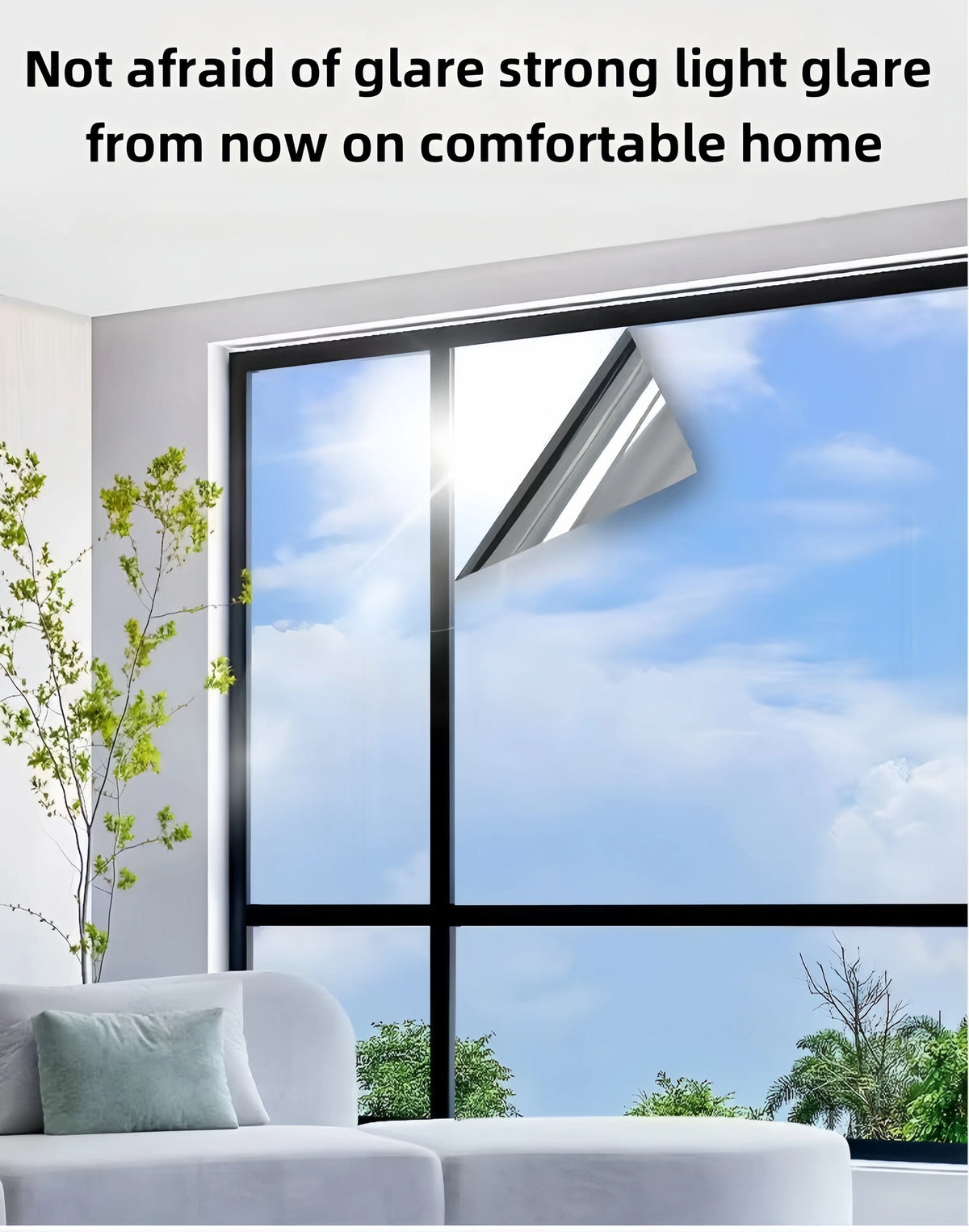 A modern window with a light-colored film installed, showing glare reduction and sun protection.
