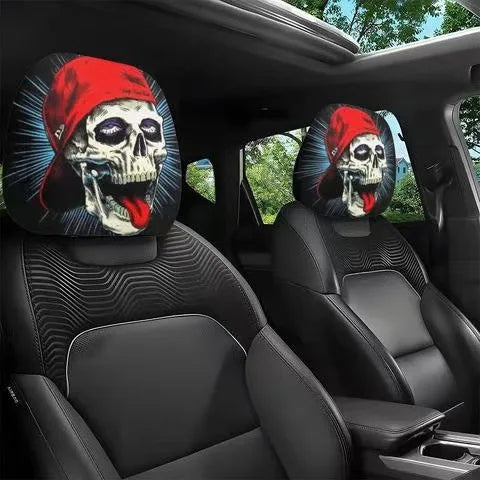 A pair of horror-themed car headrest covers featuring creepy skull faces on black leather seats.