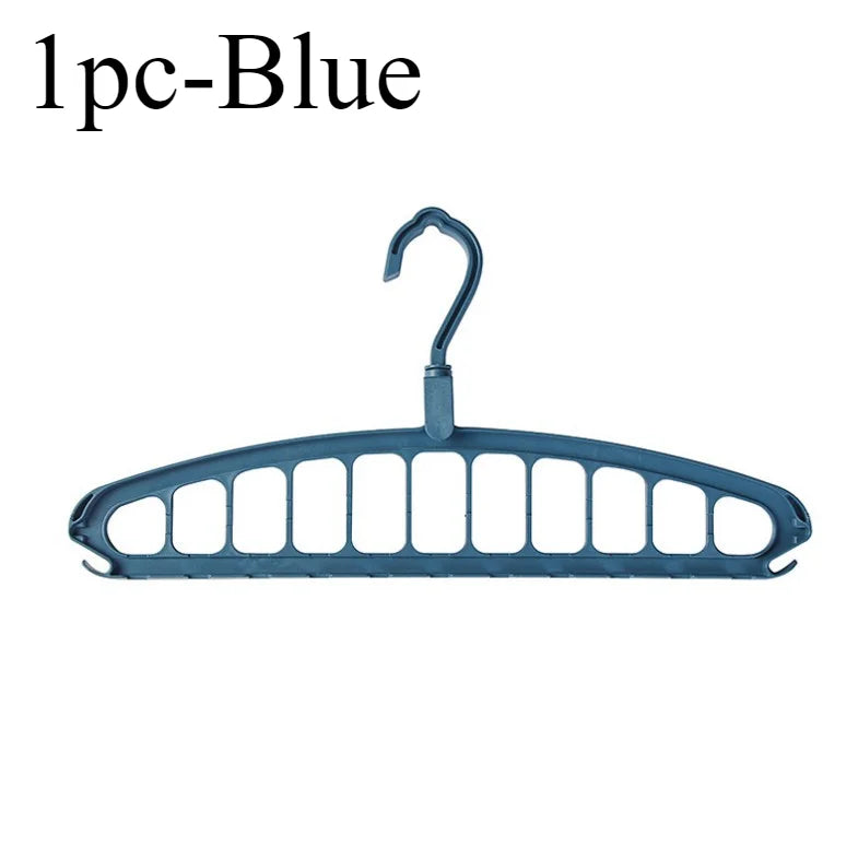 A single blue foldable multi-hole space-saving clothes hanger.