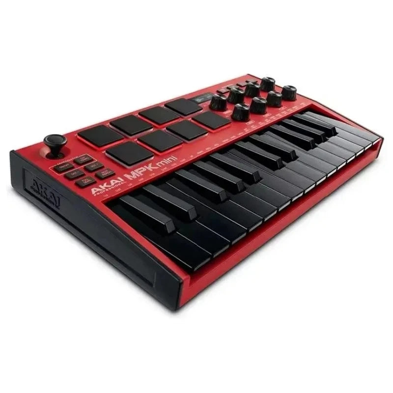 A red AKAI MPK mini MIDI keyboard controller with knobs and drum pads shown from above.