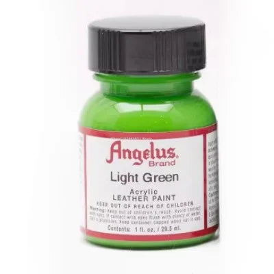 A small glass jar of Angelus Light Green acrylic leather paint for DIY projects.