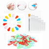 A set of plastic needle threaders and various colored plastic needles for sewing and crafting.