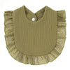 A soft olive green cotton baby bib in a bandana style with ruffled edges and a small button.
