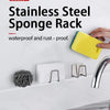 A stainless steel sponge rack holding a yellow sponge placed on a kitchen sink