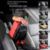 A hand is operating the opening and closing mechanism of a red car armrest cushion in a vehicle interior.