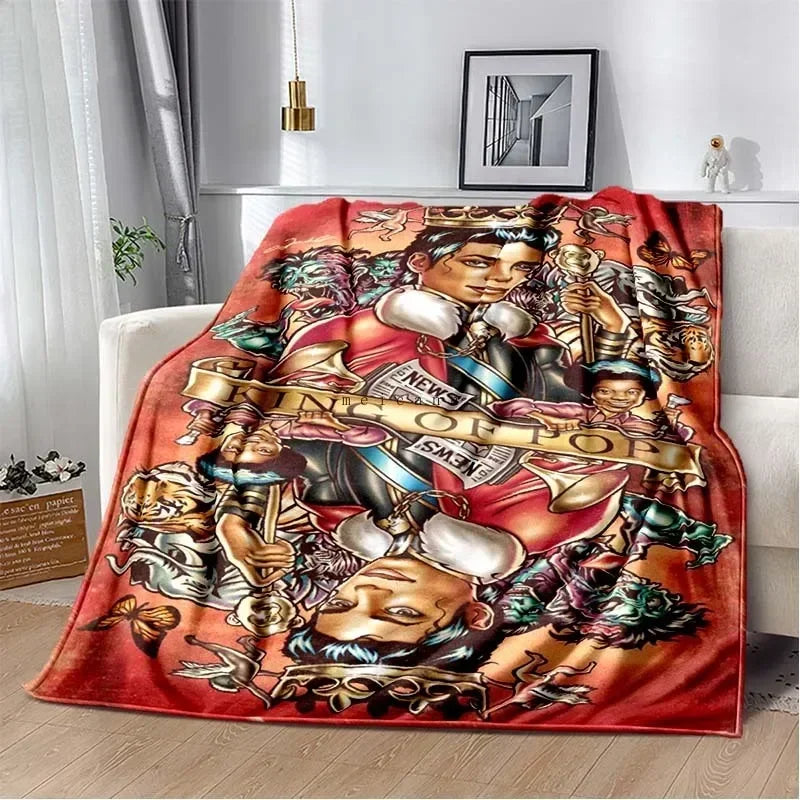 A red flannel throw blanket featuring a vintage-style print of Michael Jackson.