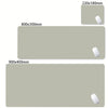 A set of oversized non-slip desk mats in various sizes, featuring a white mousepad on each.