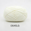 A ball of white 4-ply milk cotton yarn for knitting and crochet.