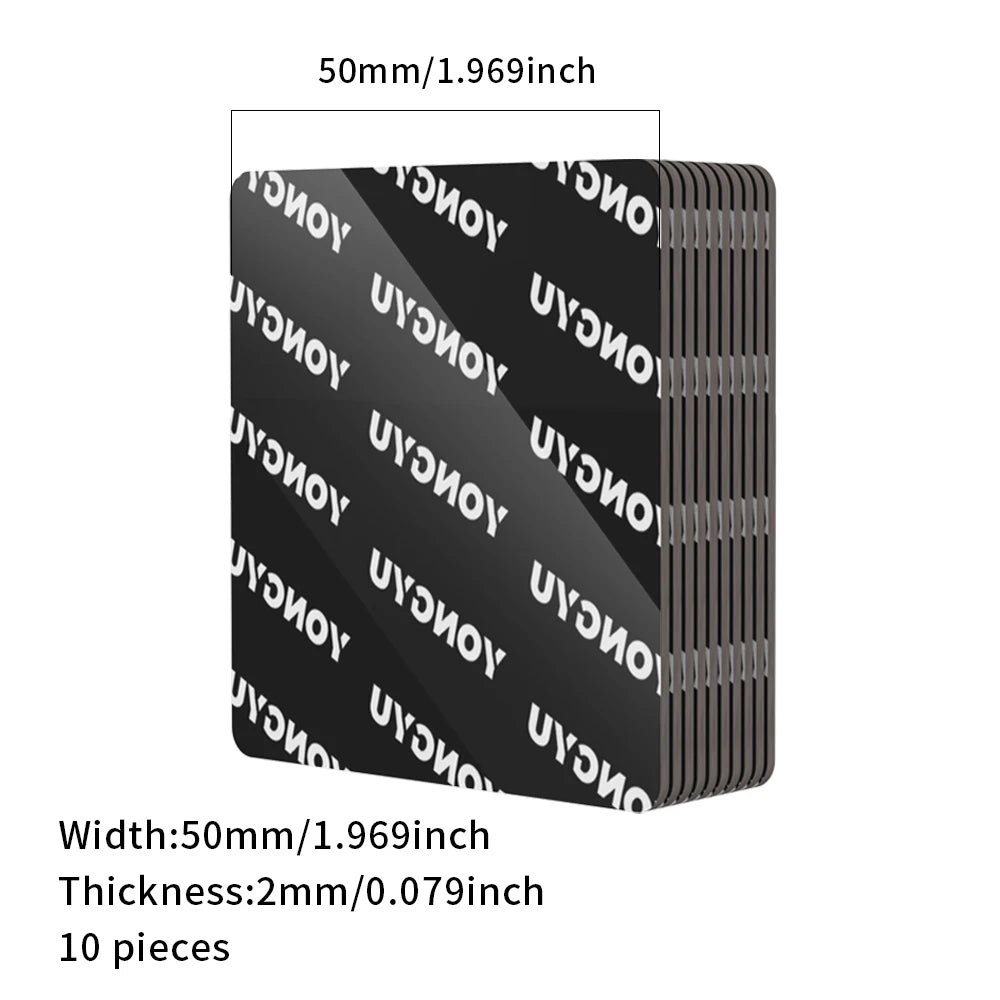 A stack of ten black adhesive pads, 50mm wide and 2mm thick, for mounting car accessories.