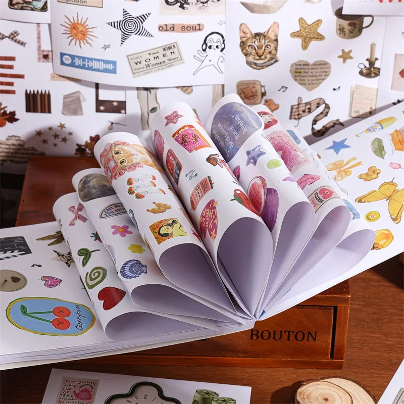 A collection of aesthetic nature stickers and patterns for scrapbooking displayed in an open book.
