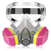 A clear full-face respirator mask with a gray and black striped filter and pink and yellow protective housing.