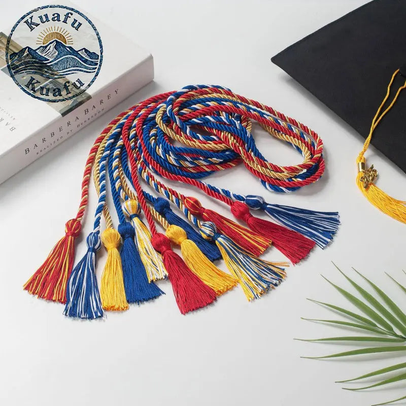A bundle of multi-colored graduation honor cords with tassels featuring double fringe trim for ceremonies and crafts.