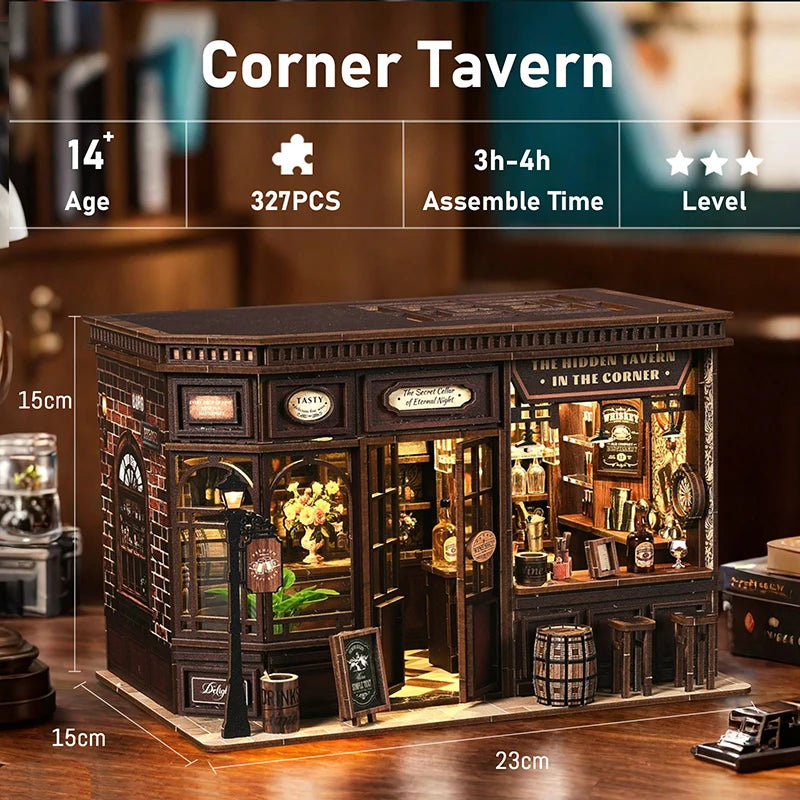A wooden miniature tavern kit featuring brickwork and detailed furniture, displayed on a wooden surface.