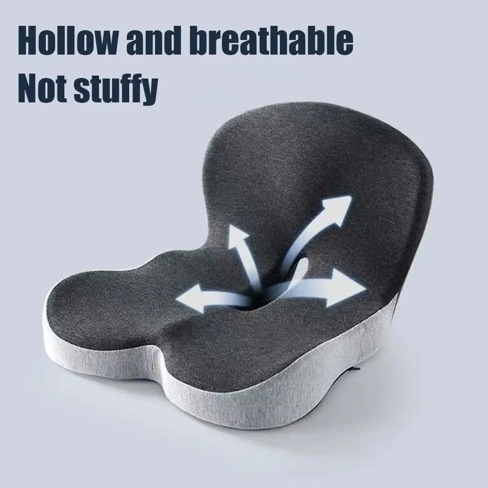 A gray ergonomic memory foam car seat cushion with a contoured shape and arrows indicating airflow.