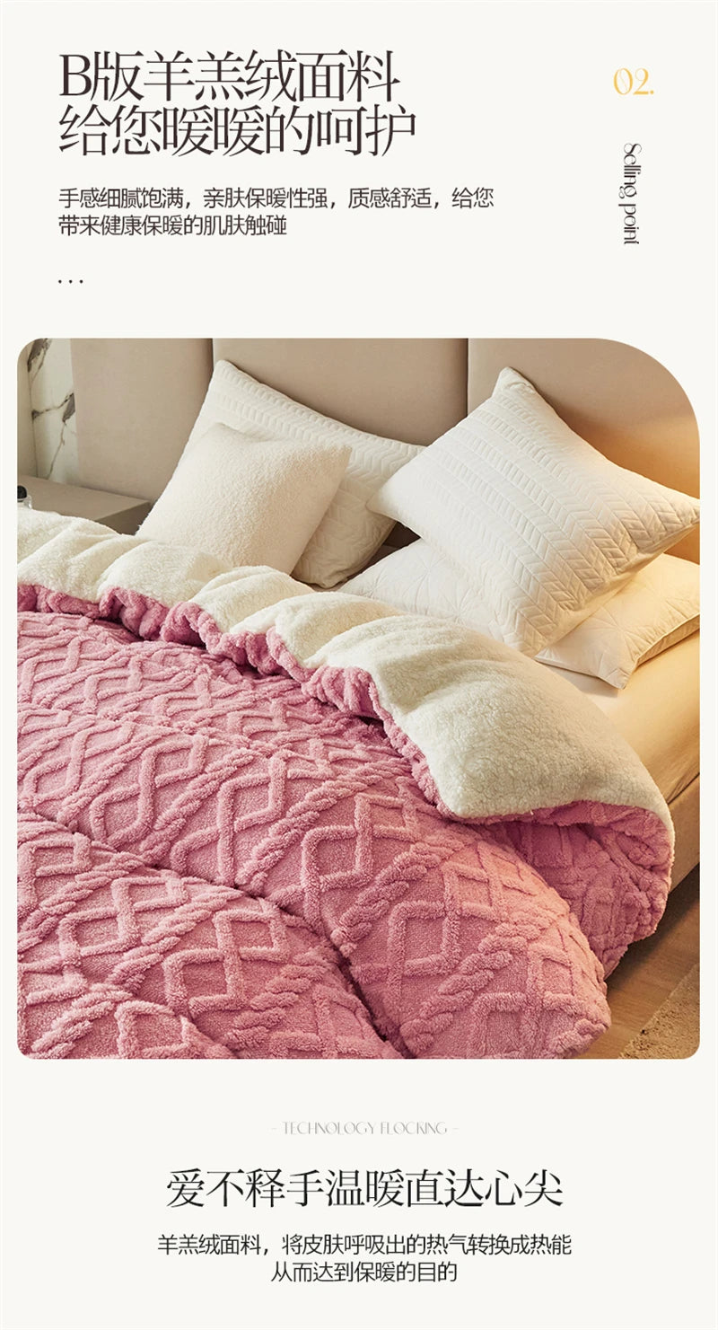 A pink quilted velvet duvet cover and blanket displayed on a bed.