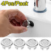 A hand holds a set of chrome-plated sink overflow covers, showing the individual components and packaging.