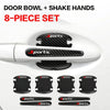 An 8-piece set of black carbon fiber door bowl and shake hands protectors for a white car door.