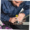 A person is using a windshield crack repair kit on a car windshield.