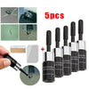 A set of five windshield repair kits for cracks, showing the tools and various crack types.
