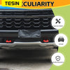 Black front bumper tow hook cover for Chevrolet Silverado and GMC Sierra vehicle.