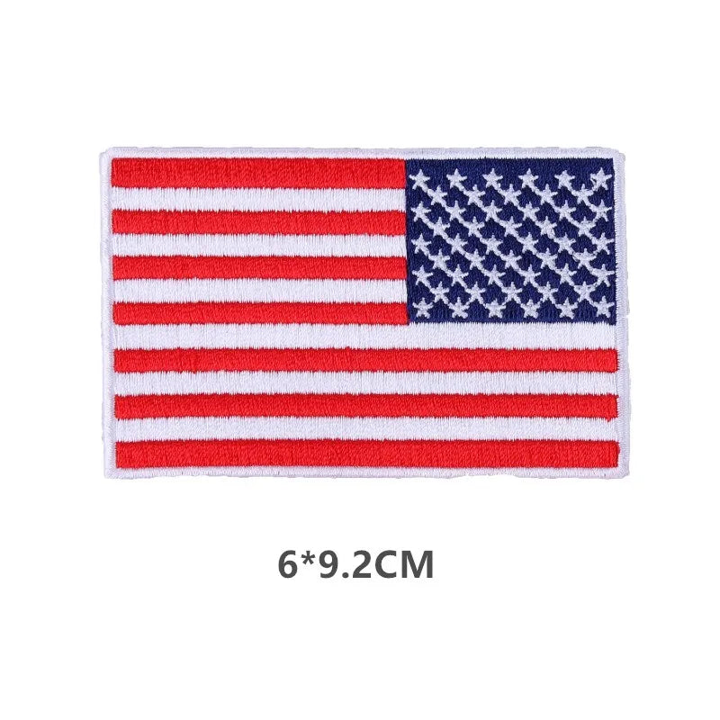Embroidered American flag sew-on patch featuring red and white stripes and blue stars on a white background