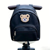 Navy blue embroidered bear stroller organizer bag with a zipper and strap