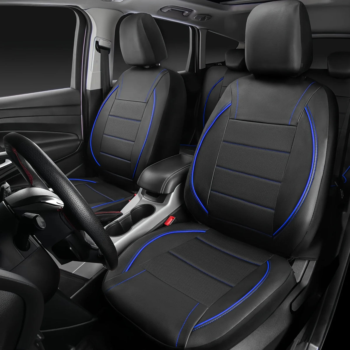 A full set of black leather car seat covers installed in a vehicle interior.